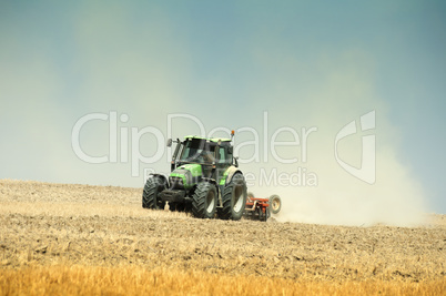 tractor plowing field