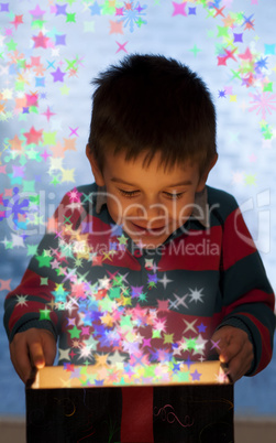 child peeping in a gift box