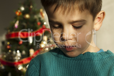 unhappy child on christmas