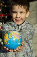 child who give as gift the world