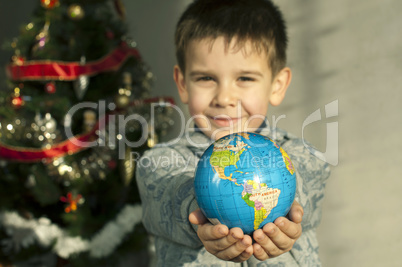 child who give as gift the world