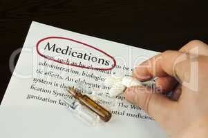 medication text and hand holding pill