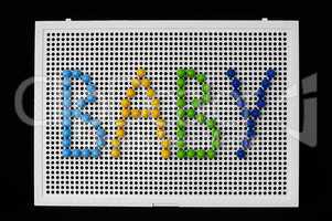 text baby on child mosaic