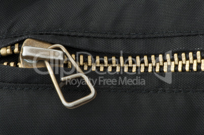 closed yellow metal zipper