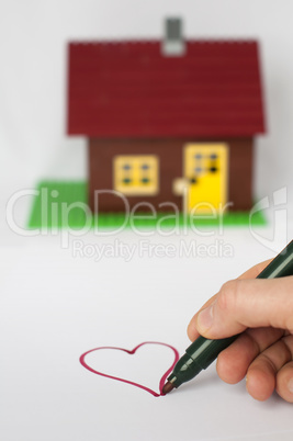 Hand write painting heart and house on background.