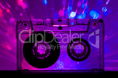 Transparent Cassette tape and disco light background