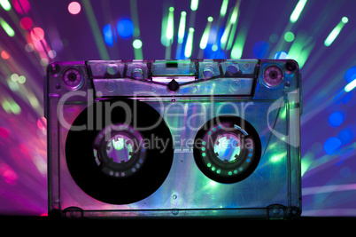 Transparent Cassette tape and disco light background