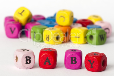 Text baby on colorful cubes