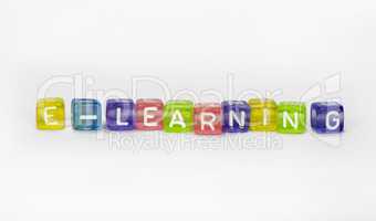 Text cE-learning on colorful wooden cubes