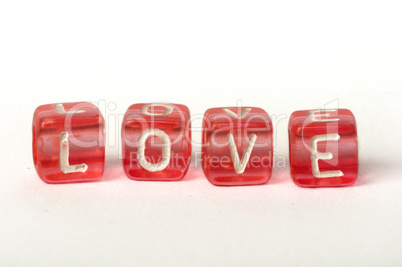 Text Love on colorful cubes