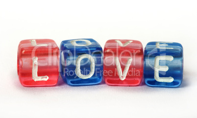 Text Love on colorful cubes