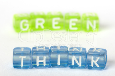 Text Think green on colorful cubes