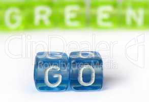Text Go green on colorful cubes