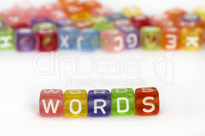 Text Words on colorful cubes over white