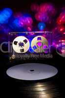 LP vinyl record, cassette tape and disco lights