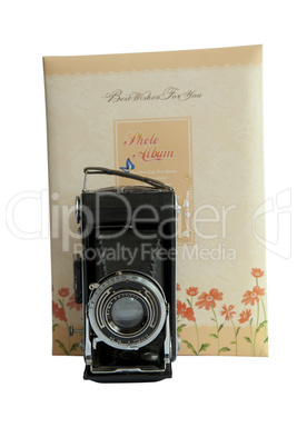 Photo album and vintage camera