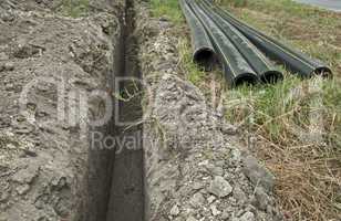 Plastic pipes in a ditch