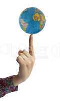 Hand holding globe on finger