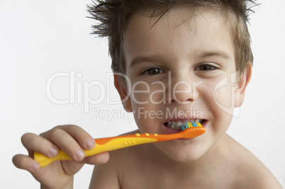 Boy washing teeth