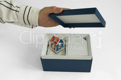 Gift box with house inside