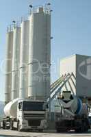 Cement factory and a truck loading cement