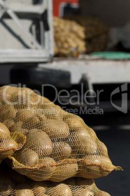 Potatoes in mesh bags