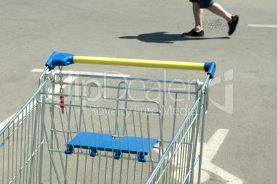 Shopping cart and a man who walks