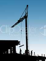 Construction site with crane and workers