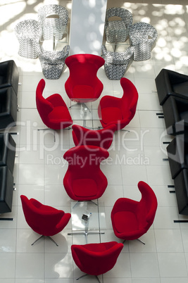 Luxurious red chairs in restaurant