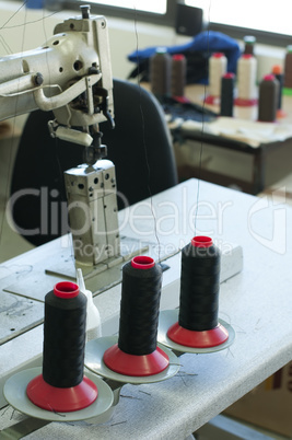 Reels of threads and sewing machine