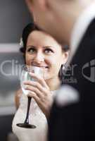 elegant woman drinking wine at a function
