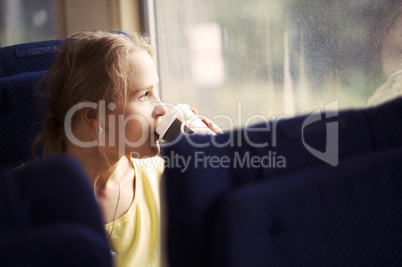 pensive woman traveling by train