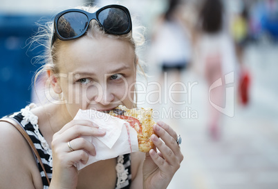 young woman eating