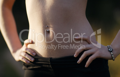 girl belly with piercing