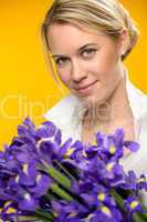 woman with spring flowers purple iris