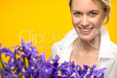 smiling woman with spring purple iris