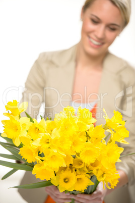 yellow spring narcissus woman in background