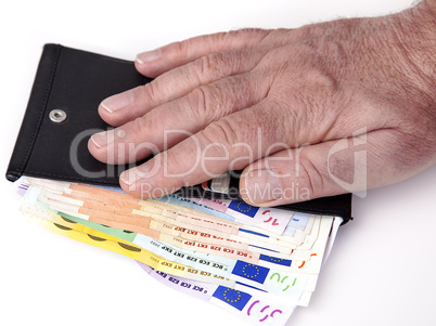 hand reaching for wallet with banknotes