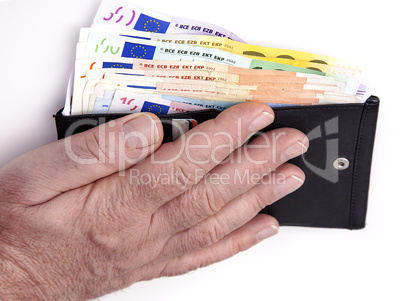 hand reaching for wallet with banknotes