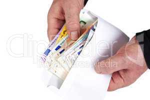 hand holding envelope with paper money