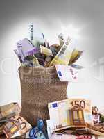 money bag with euro notes and coins