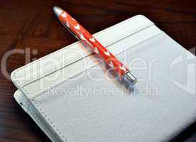 Electronic  book with pen wiht hearts