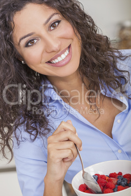 young woman girl eating healthy fruit salad