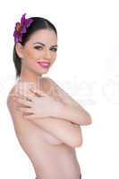 alluring beautiful woman posing topless