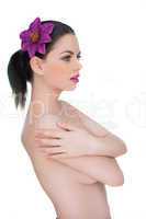 alluring beautiful woman posing topless