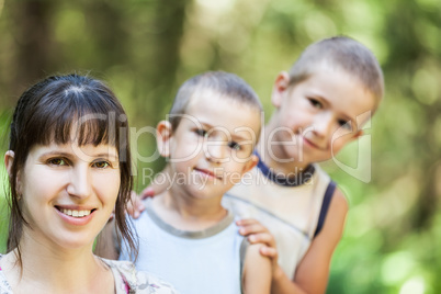 Mother and sons walking outdoor