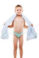 Child boy holding cotton textile towel