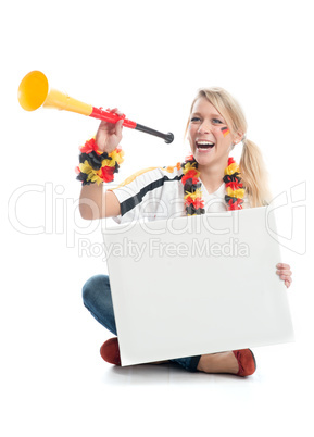 Fußballfan mit Plakat und Vuvuzela