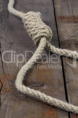 noose on wooden background