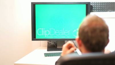 casual businessman working in office sitting at desk